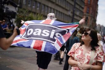 An Oasis fan in Cardiff, ahead of the first show in the band's long-awaited reunion tour, which kicked off at the Principality Stadium in Cardiff, Wales, on July 4, 2025. (Credit: Jordan Pettitt/PA Images via Getty Images)