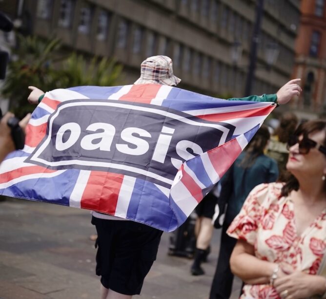 An Oasis fan in Cardiff, ahead of the first show in the band's long-awaited reunion tour, which kicked off at the Principality Stadium in Cardiff, Wales, on July 4, 2025. (Credit: Jordan Pettitt/PA Images via Getty Images)