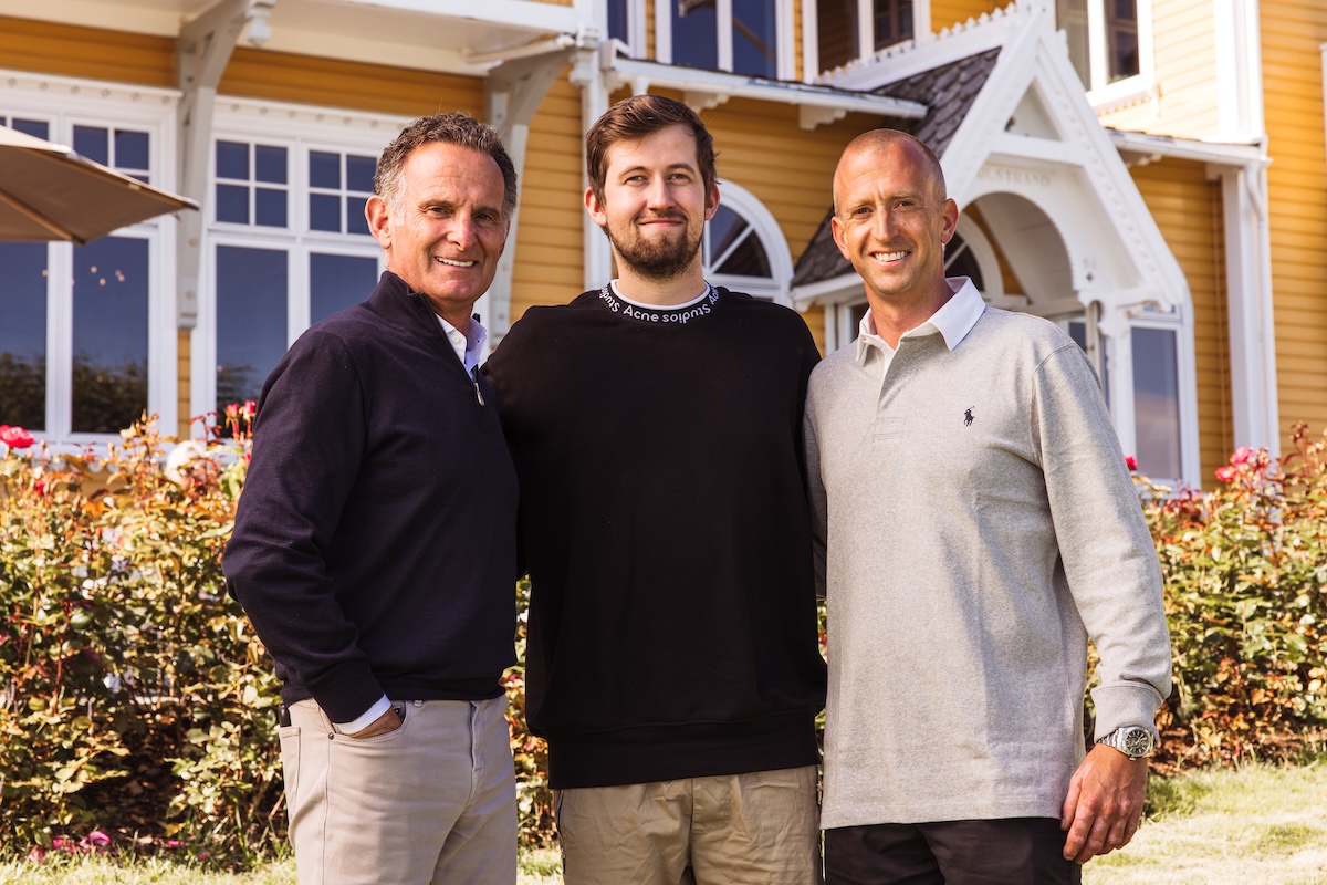 Charles Goldstuck (left), Norwegian EDM star Alan Walker (center), and Gunnar Greve, Kreatell CEO & Alan Walker’s manager (right), pictured in front of Solstrand Hotel & Bad in Bergen, Norway. (Credit: Robin Bøe)