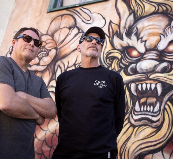 84 Days band members Cameron Webb (left) and Randy Bradbury in the Chinatown neighborhood of Los Angeles. (Credit: Steve Appleford)