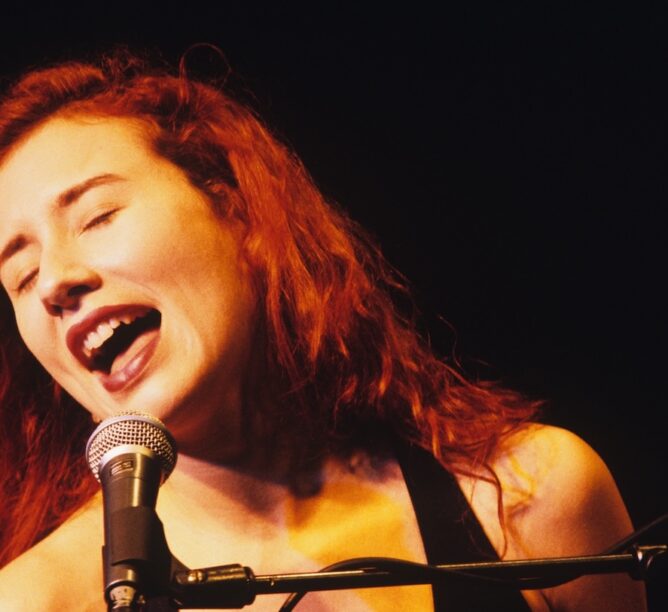 Tori Amos performs on stage in 1996. (Credit: Michel Linssen/Redferns)