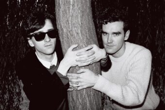 Johnny Marr (left) and Morrissey of the group The Smiths in 1983. (Credit: Clare Muller/Redferns)