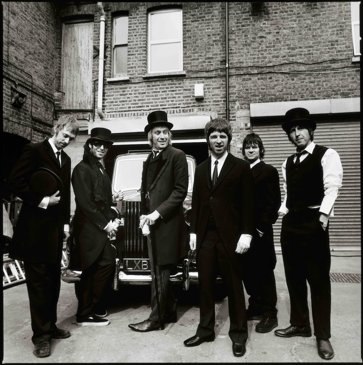 Oasis during their 2005 music video for their song, "The Importance of Being Idle." (Courtesy of Zak Starkey)