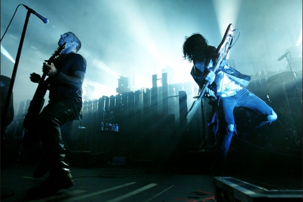 Trent Renzor and Aaron North of NIN perform at Gibson Ampitheater on December 10, 2005 in Los Angeles / Photo by Getty Images