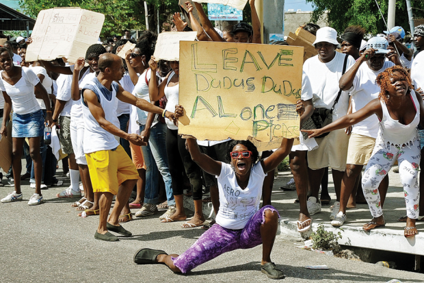 His supporters take to the streets / Photo by Ian Allen/The Jamaica Gleaner/AP Photo