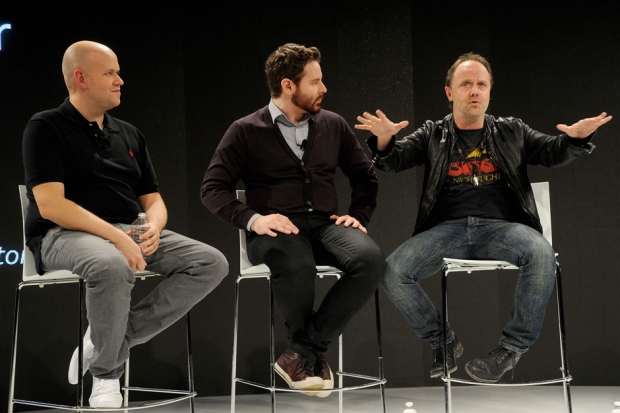 Spotify CEO Daniel Ek (L), Napster co-founder Sean Parker (C) and Metallica's Lars Ulrich attend the 2012 Spotify press event on December 6 in New York City / Kevin Mazur/WireImage