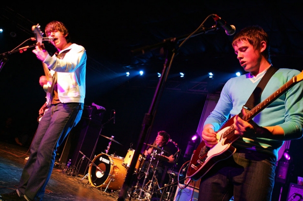 Alex Turner and Jamie Cook of the Arctic Monkeys play at the SXSW Film and Music Festival in 2006 / Photo by Getty Images