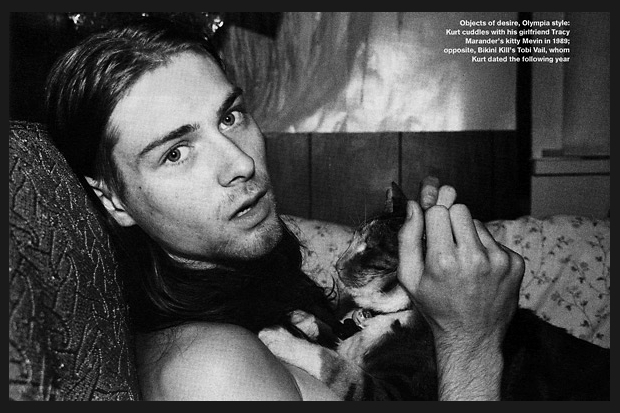 Cobain cuddles with his girlfriend Tracy Marander's kitty Mevin in 1989. / Photo by Tracy Marander