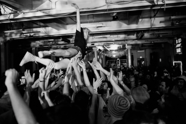 Caila Thompsis-Hannant of Mozart's Sister crowd-surfing / Photo by Richmond Lam