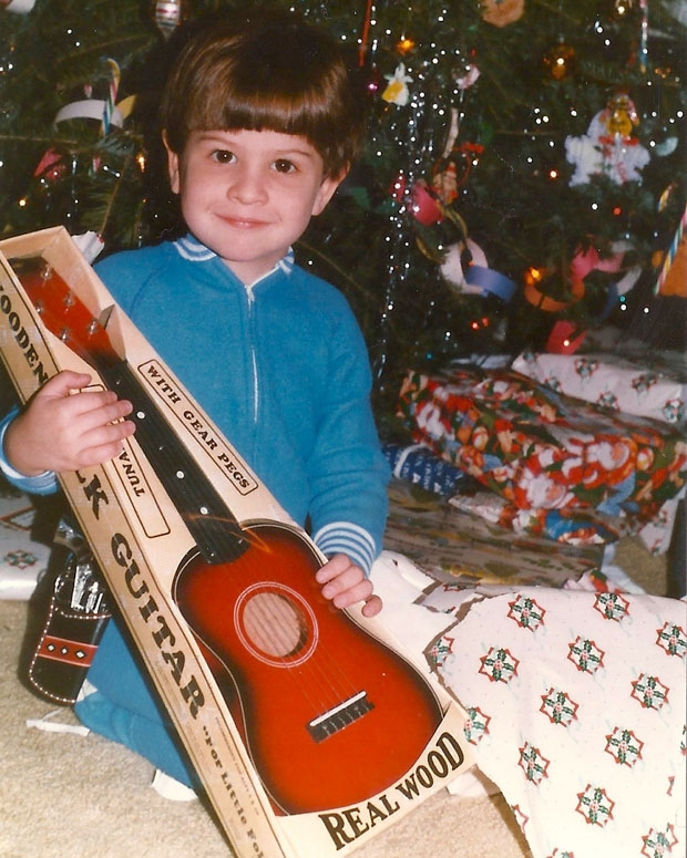 A young Kyle Thomas gets his first guitar for Christmas / Photo courtesy King Tuff